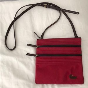 Dooney & Burke red nylon triple zip crossbody